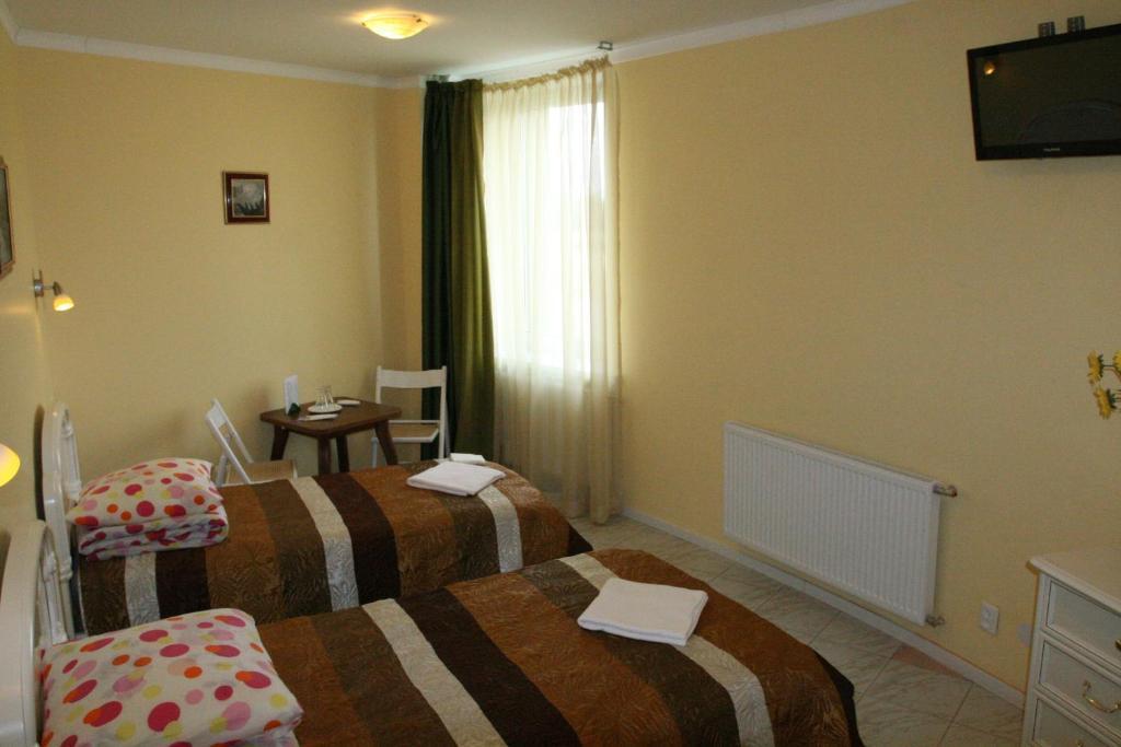 Vaivorykste Hotell Šiauliai Rum bild